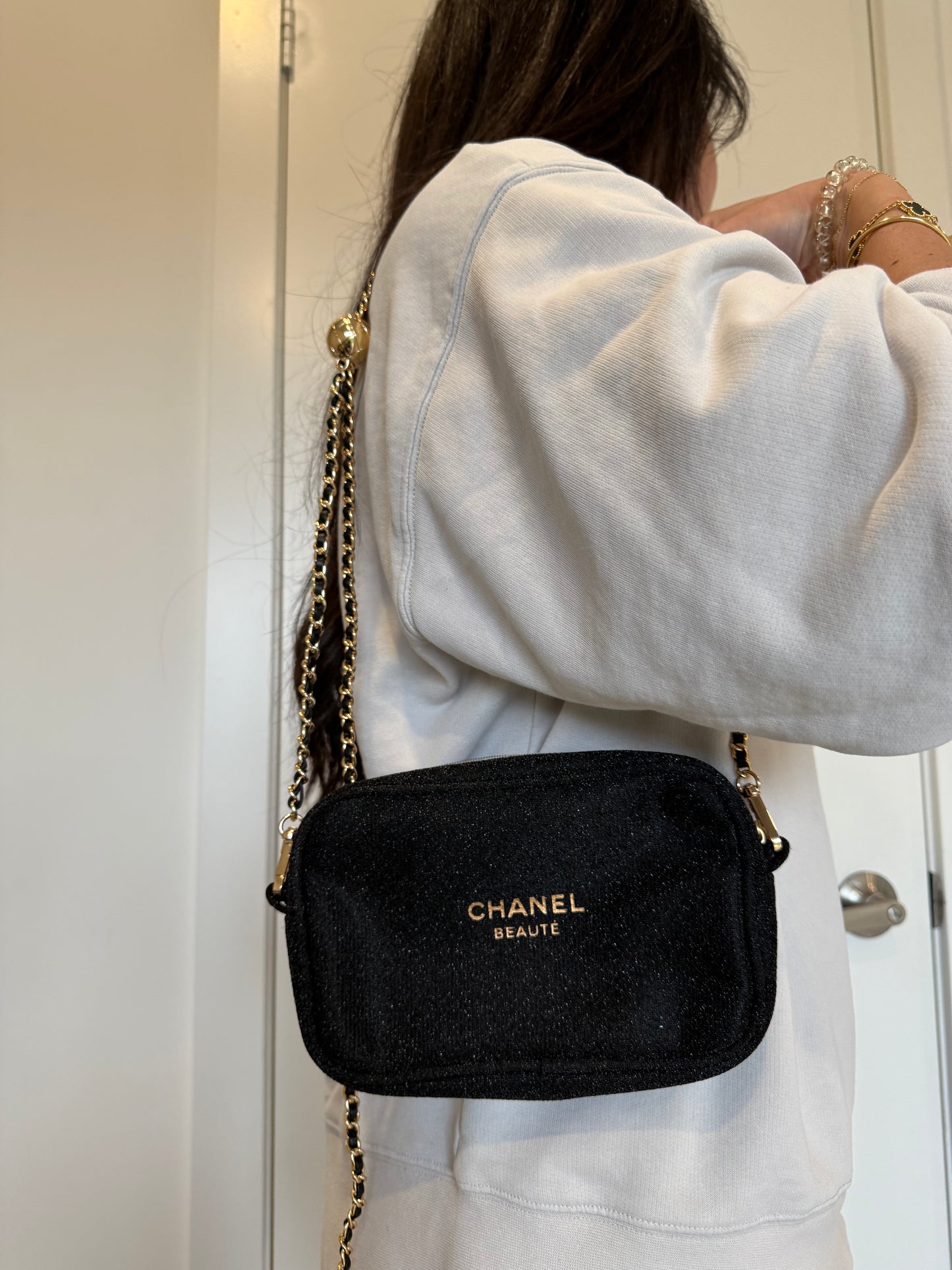 New Chanel beaute crossbody with adjustable ball strap chain ! Fits wallets phones keys makeup etc