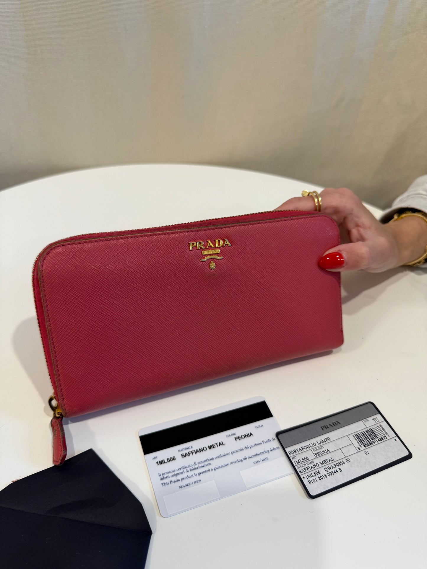 Prada pink Saffiano leather zip around wallet with authenticity card!Retail $1290 Google it.