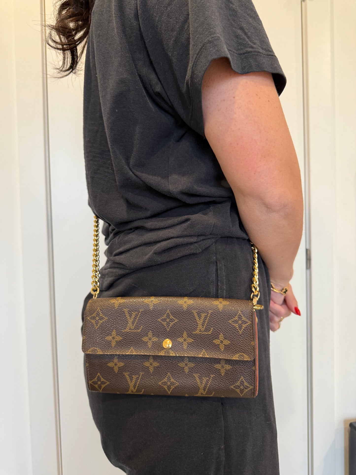 Louis Vuitton sarah wallet with added chain strap fits phones cards cash coins