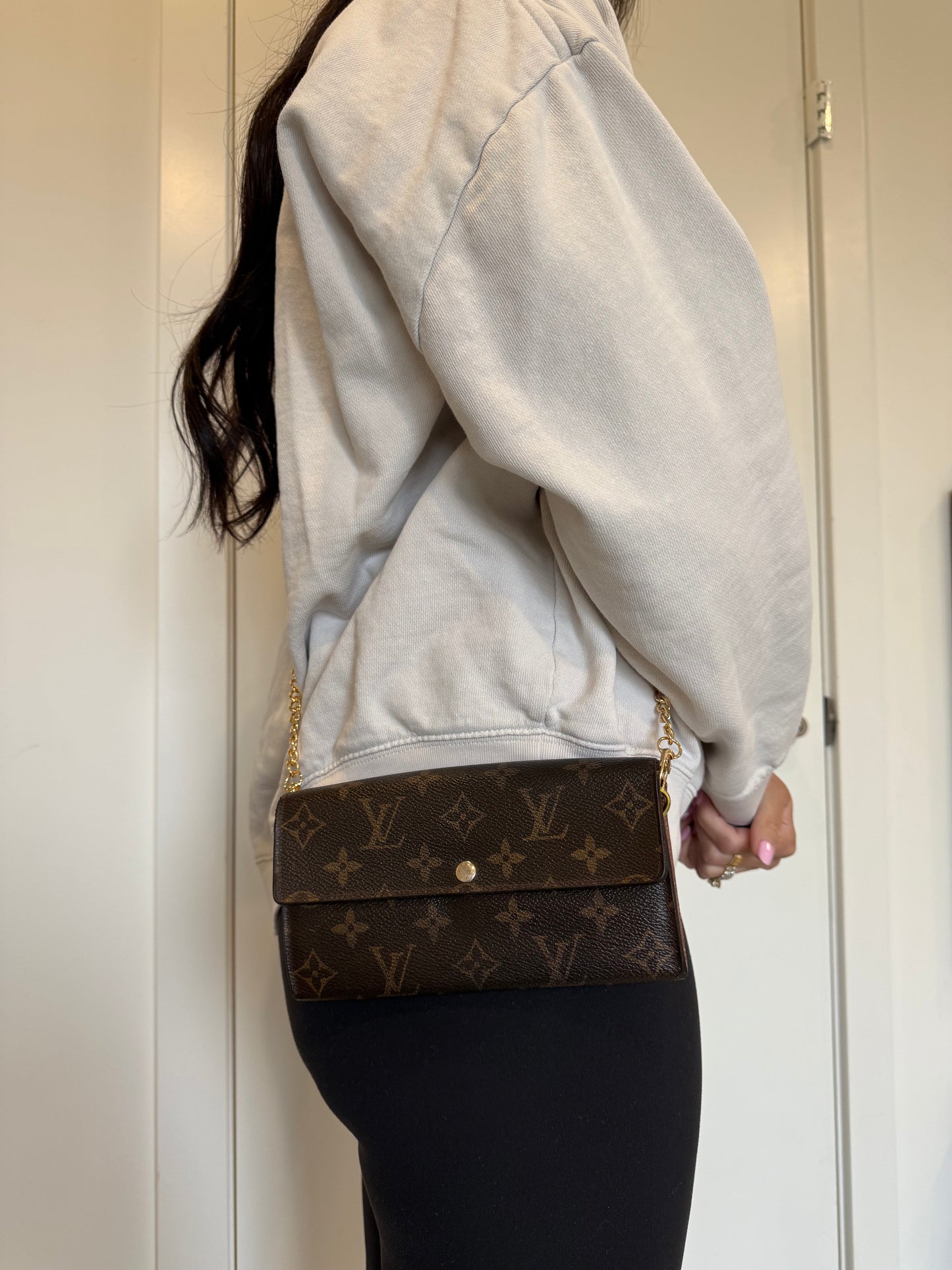 Louis Vuitton monogram Sarah wallet with added strap and original box fits phones ! Selling cheap !