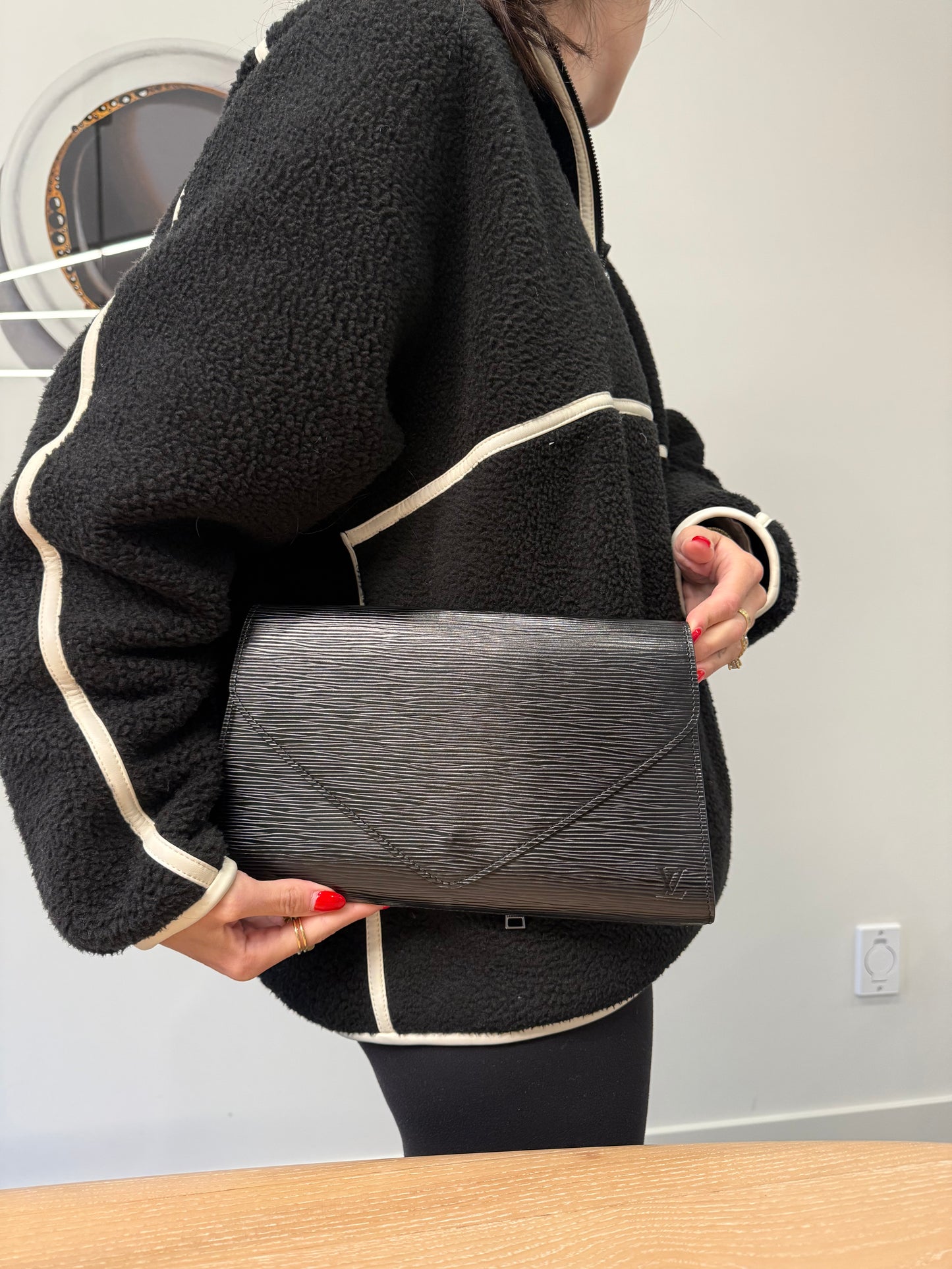 Louis Vuitton arts deco gm in epi black! Absolutely gorgeous condition inside and out! Fits phones wallets keys etc