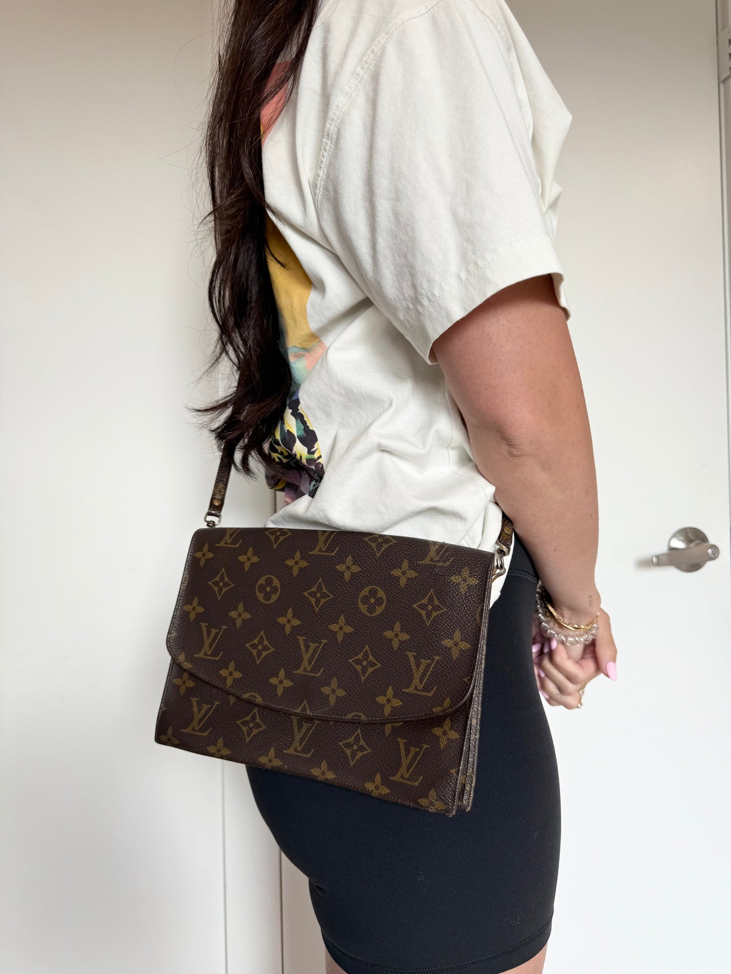 Louis Vuitton monogram rabit flap crossbody clutch with added original lv strap!! Fits phones wallets keys makeup etc