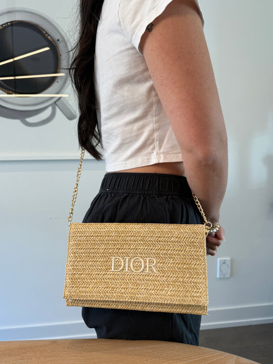 Brand new Dior raffia magnetic closure crossbody clutch with added strap! Zipper closure fits phones makeup keys etc