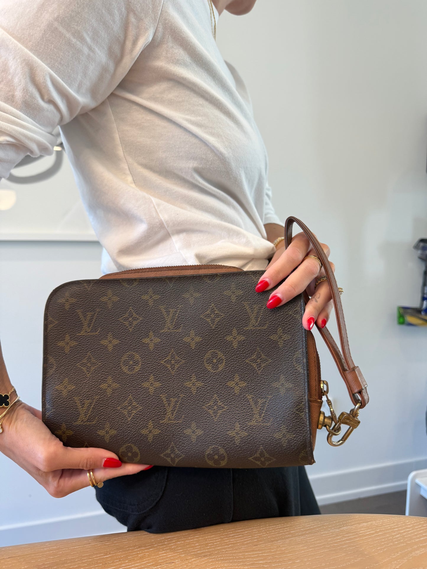 Louis Vuitton monogram orsay wristlet with original strap