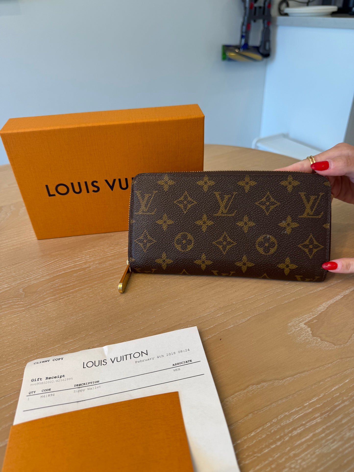 Louis Vuitton monogram zippy wallet with pink interior $1100 retail!!!! In box with gift receipt