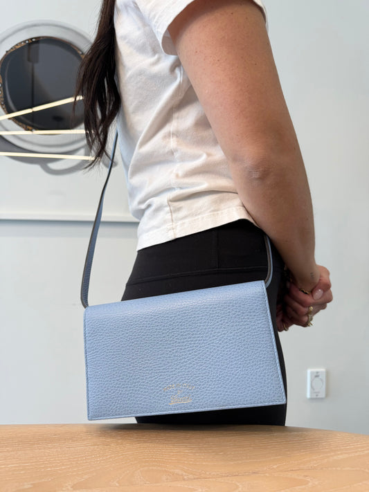 Like new Gucci baby blue swing original crossbody with original strap fits phones keys cards cash coins etc with original dustbag