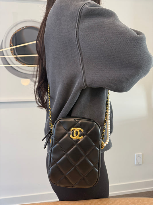Brand new in box ! Chanel quilted camera adjustable strap crossbody fits phones keys makeup wallets etc ! This is a novelty item , not a $10,000 bag!