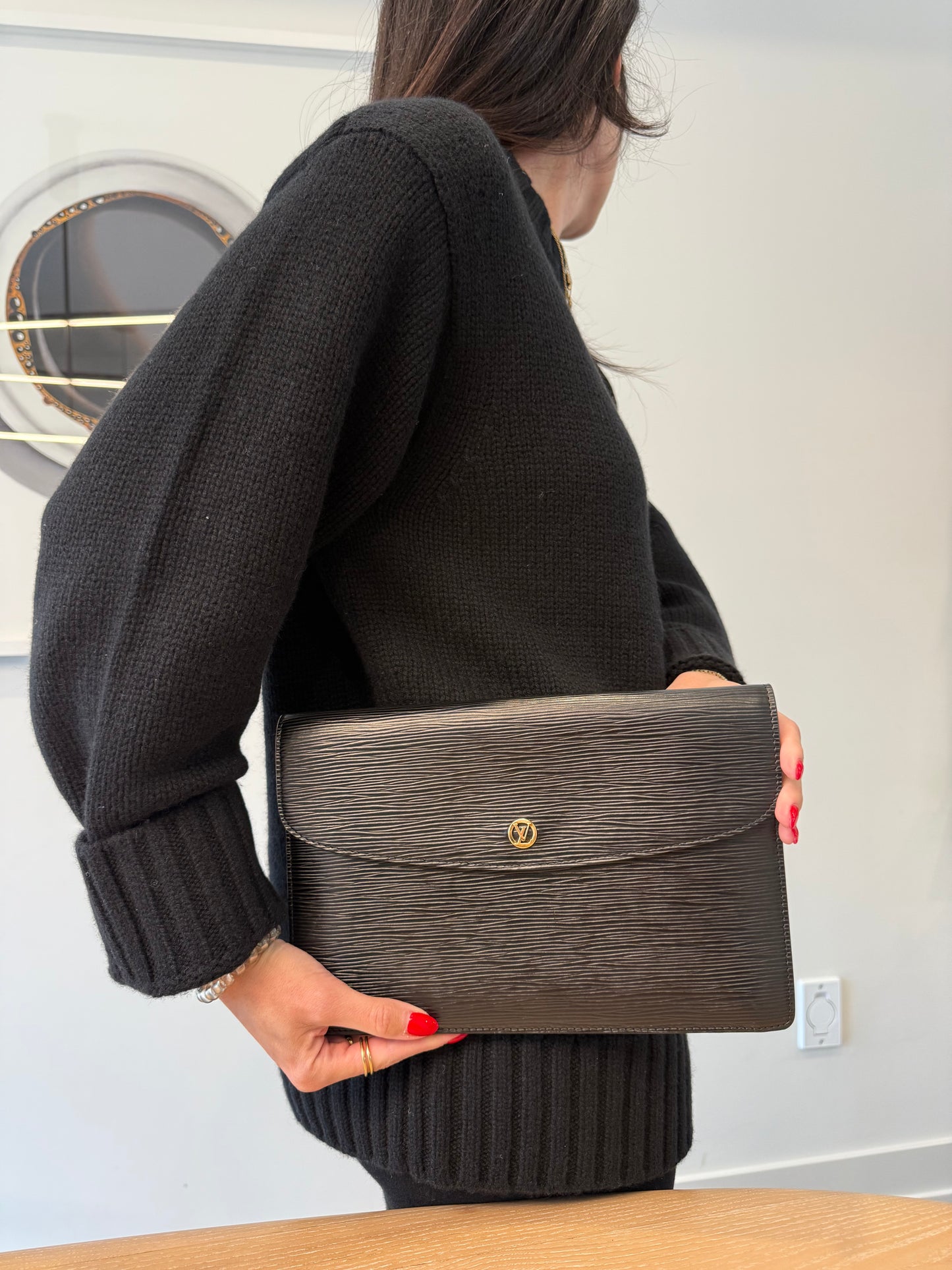 Rare Louis Vuitton epi black / gold montaigne crossbody clutch in pristine condition fits phones wallets keys etc