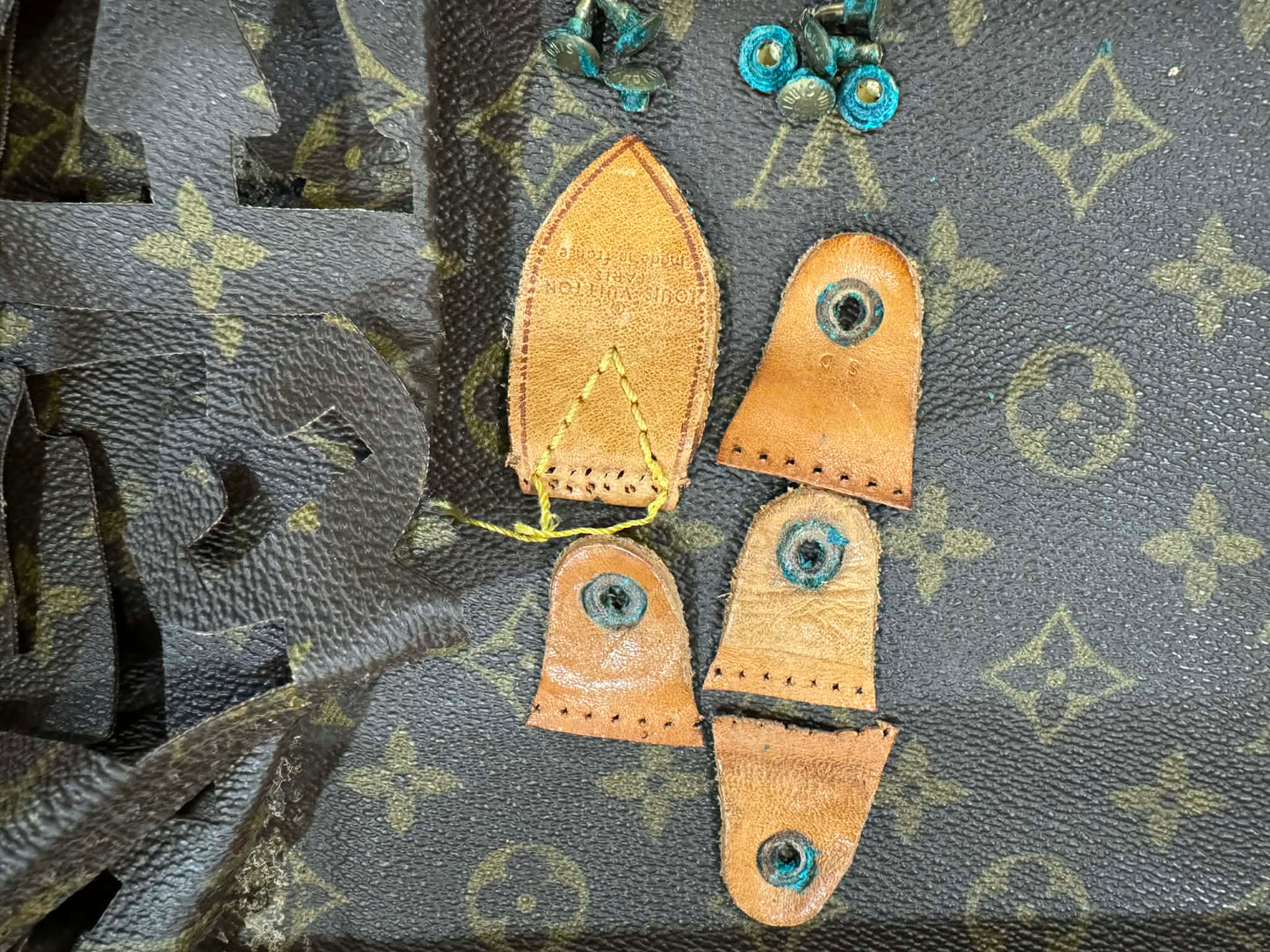 Upcycled 100% authentic keychain with brown tan interior made from a keepall 60