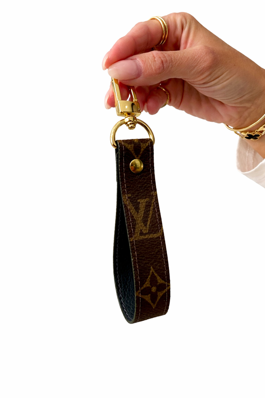 Upcycled long clip on Louis Vuitton keychain tassle clip on with navy interior made from a keepall 60