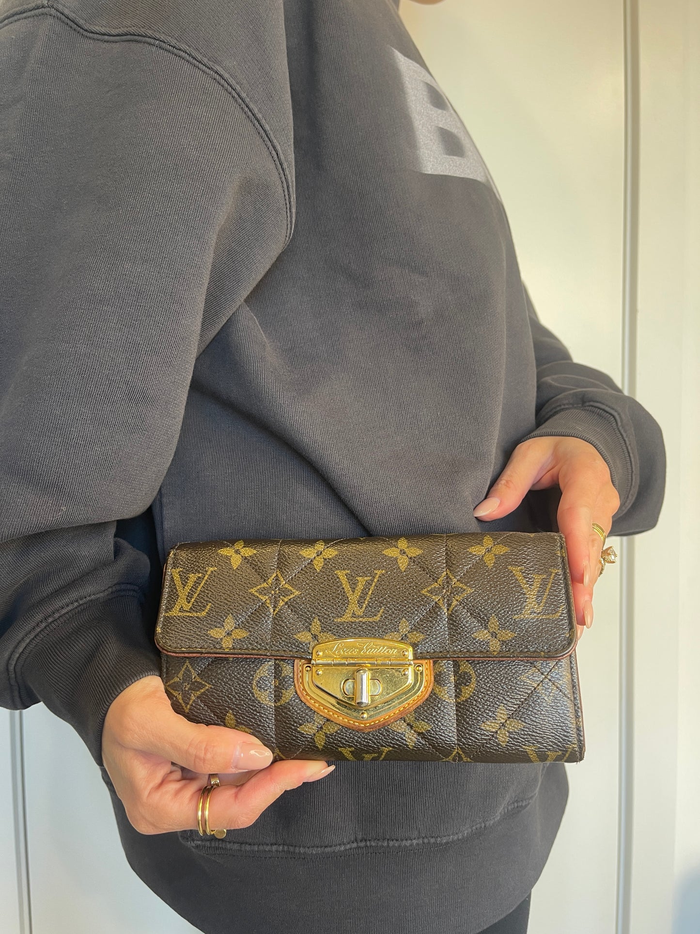 Louis Vuitton monogram etoile wallet with a chain