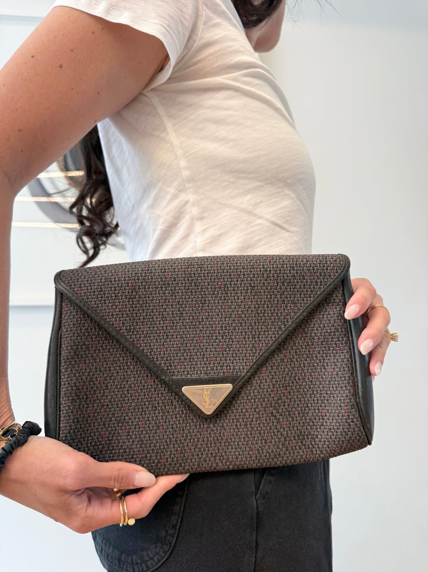 Authentic Yves Saint Laurent heavy duty magnetic closure zipper top clutch in gorgeous condition! Fits phones keys makeup wallets etc