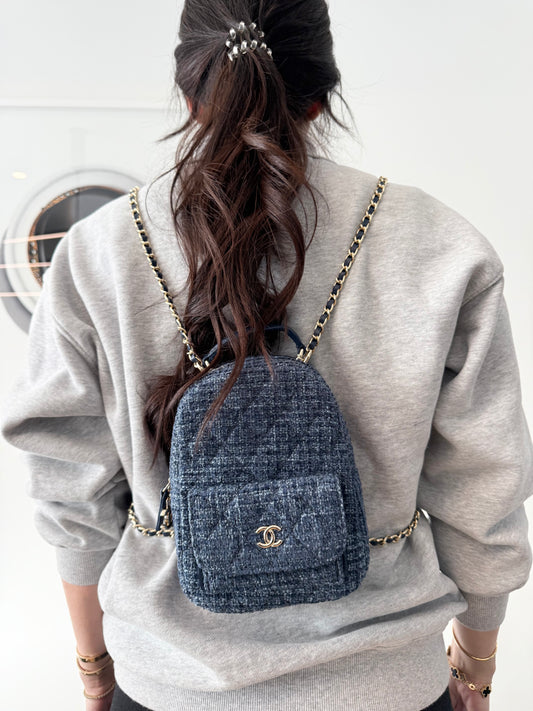 Brand new in box Chanel makeup blue denim / gold backpack! This is a novelty heavy duty makeup piece not a $15000 bag! Save your money !
