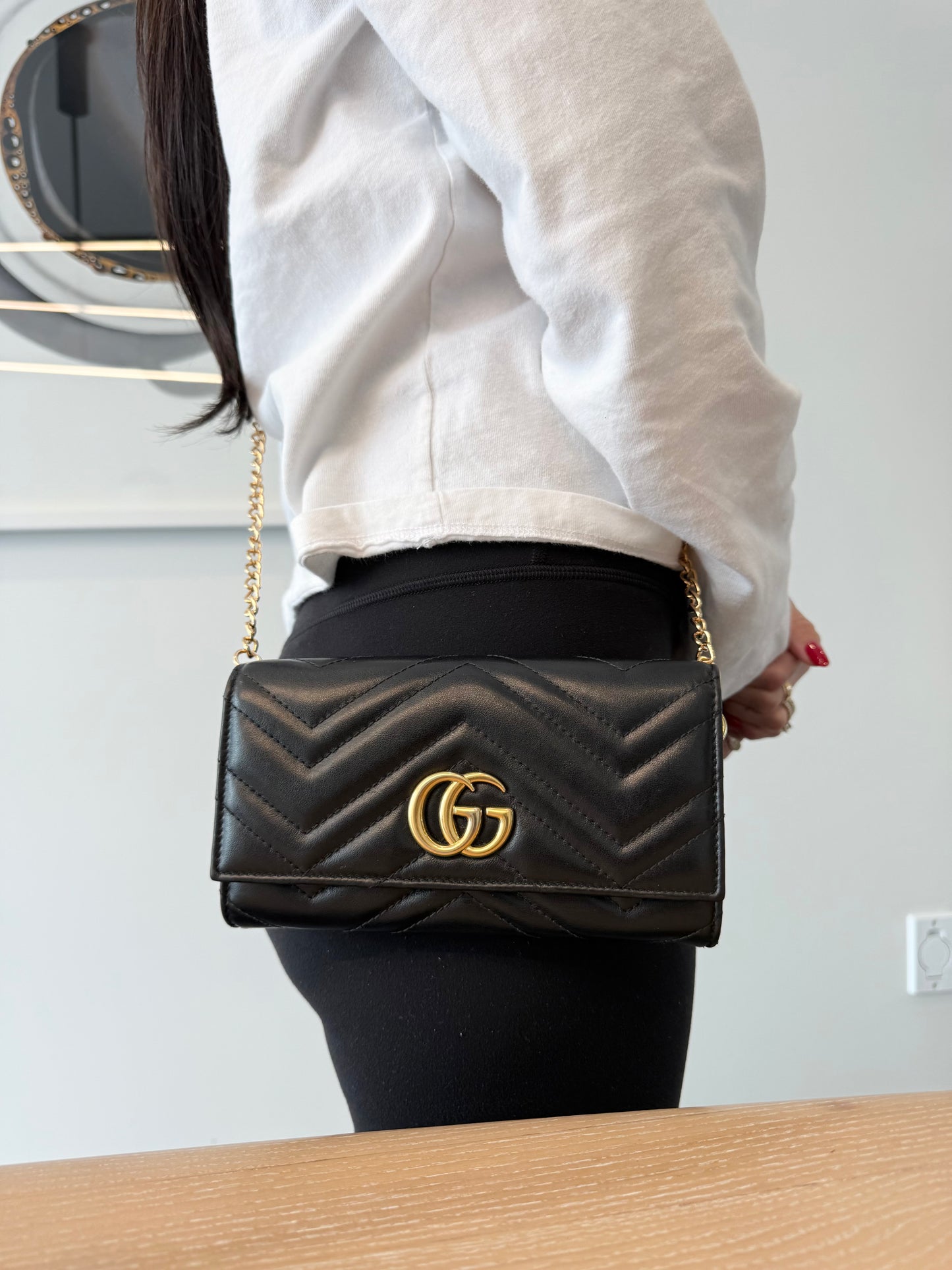 Authentic Gucci Marmont flap wallet with added removeable strap in literal brand new condition fits phones cards cash coins etc retail is $1100 plus tax !