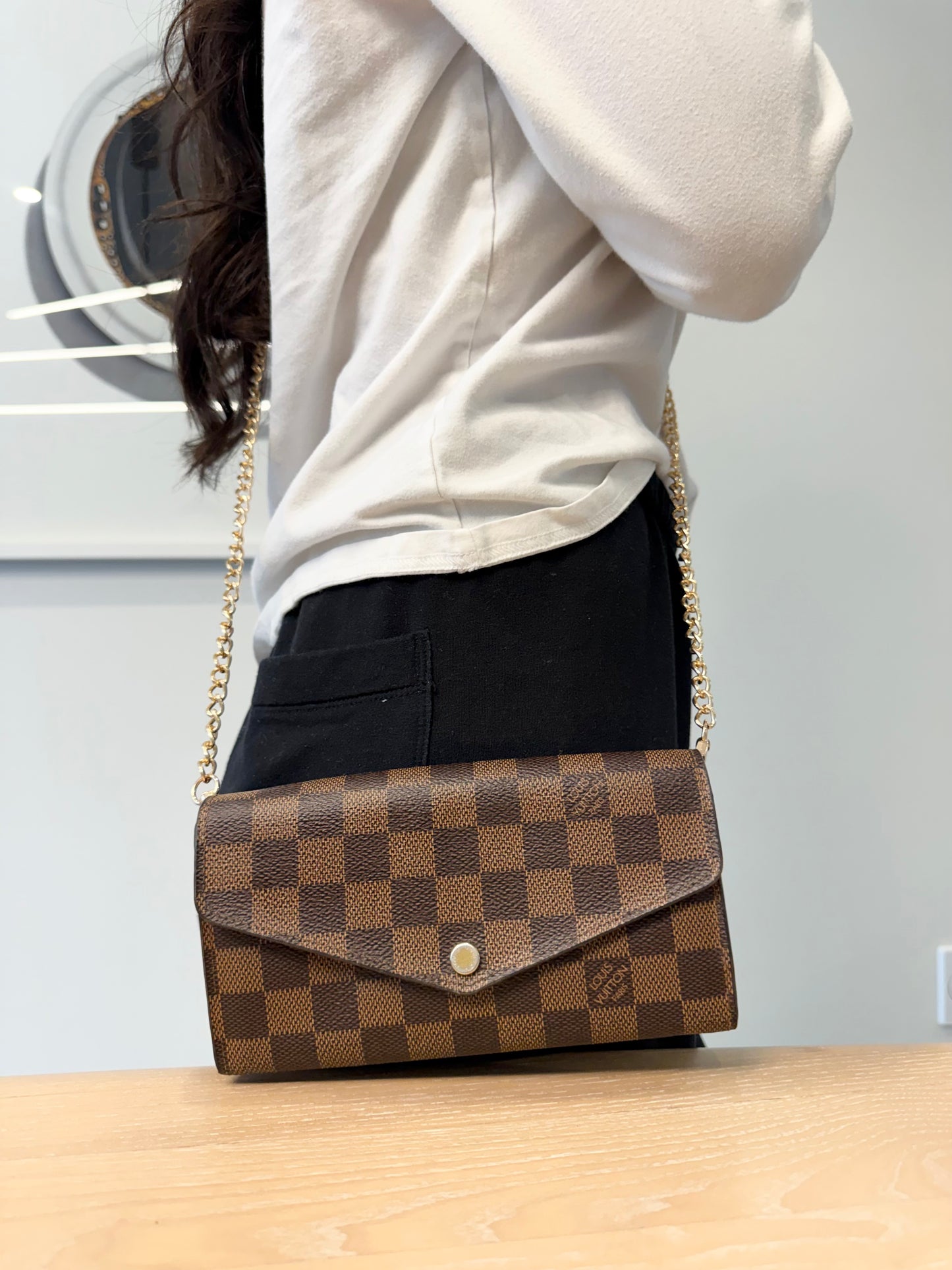 Authentic Louis Vuitton damier ebene Sarah wallet with added removeable strap fits phones etc retail $936 plus tax