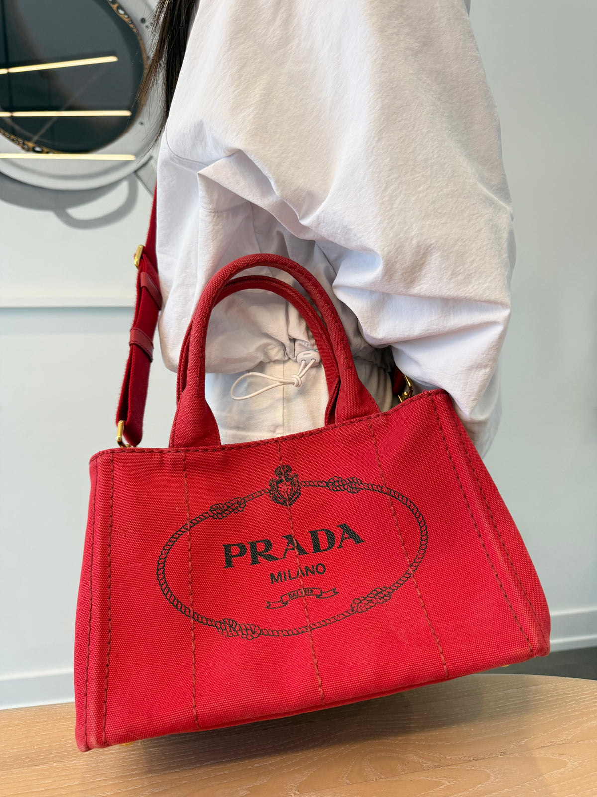 Authentic Prada Capana heavy duty denim in red and black with original adjustable strap ! I’ve never recieved one so clean!!