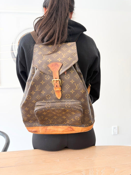 Authentic Louis Vuitton monogram Montsauris GM unisex adjustable strap backpack with NO rips on the trim!!