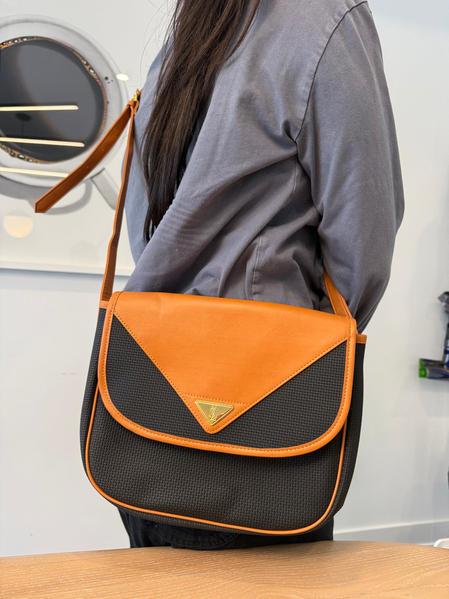 Yves saint Laurent magnetic closure adjustable strap multiple compartment gorgeous inside and out fits a lot