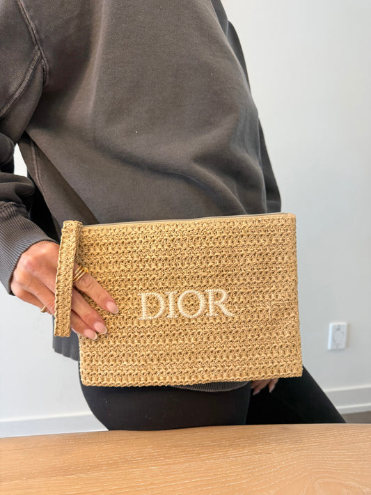 Authentic Dior beauty wristlet in raffia . Brand new in box
