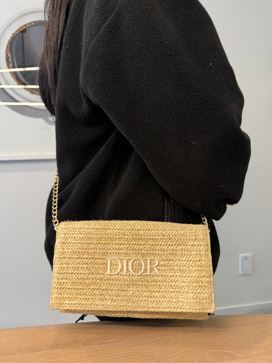 Authentic Dior beauty raffia clutch with added removeable strap ! Fits a lot