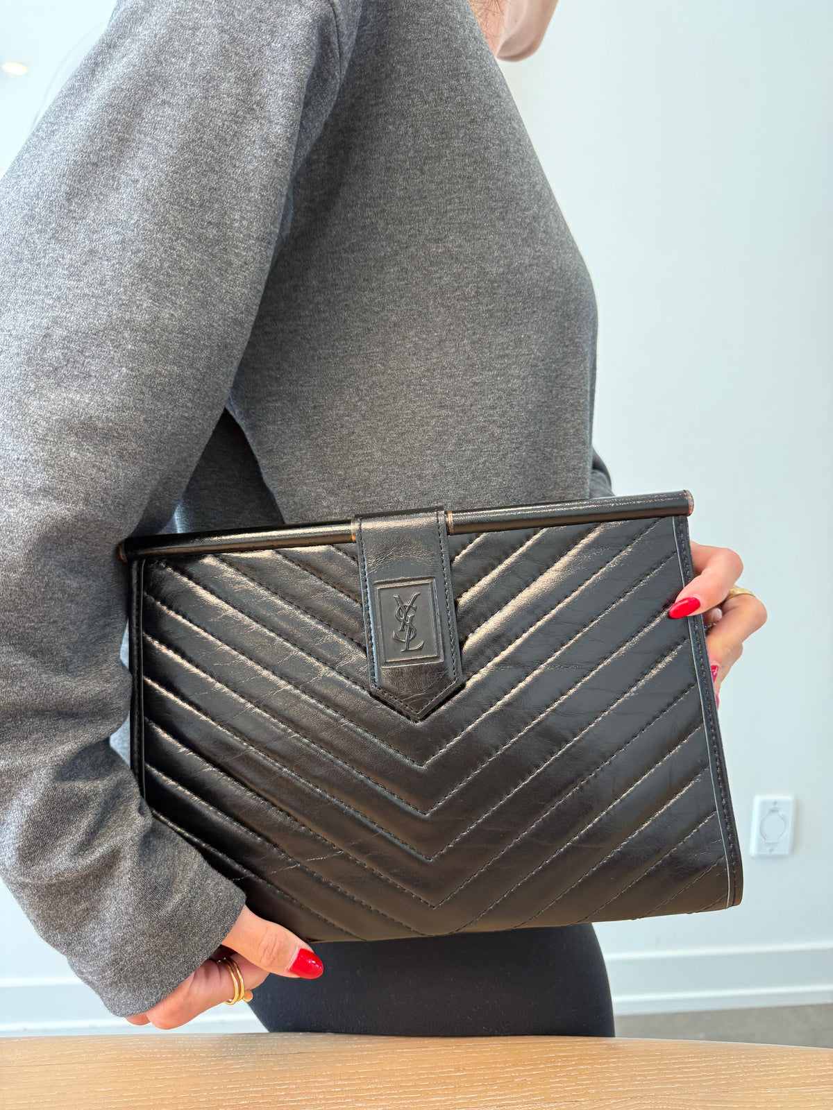 Authentic Yves Saint Laurent Lambskin magnetic closure clutch in absolute pristine preloved condition In dustbag