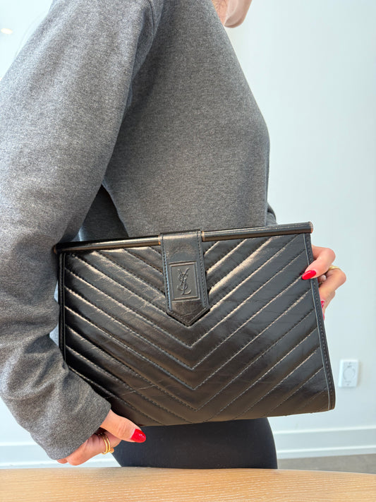Authentic Yves Saint Laurent Lambskin magnetic closure clutch in absolute pristine preloved condition In dustbag
