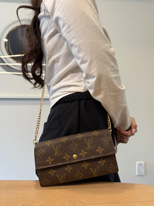 Authentic Louis Vuitton Monogram Sarah Wallet with added removeable strap ! Fits all phones cards cash coins etc