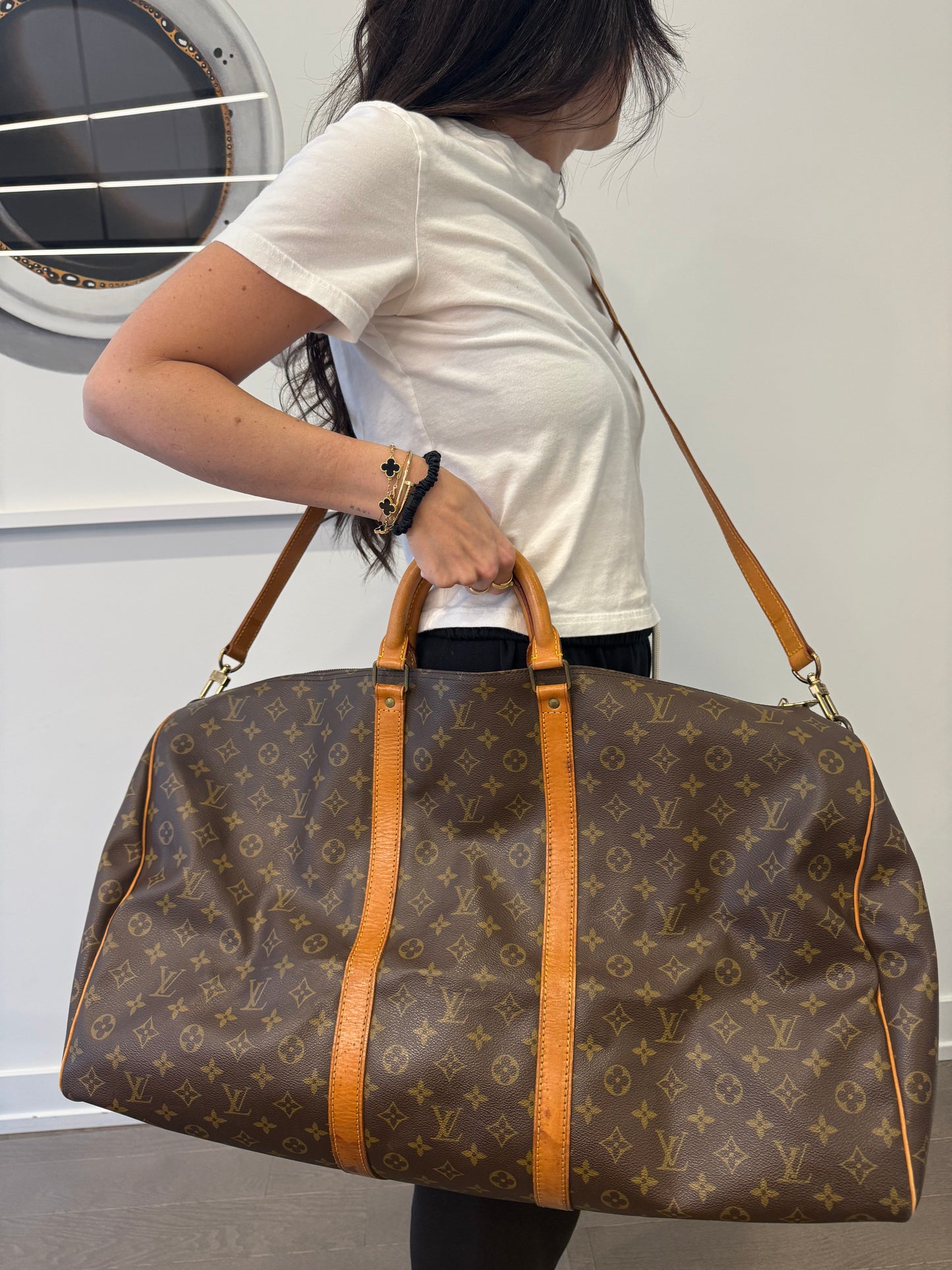 Authentic Louis Vuitton Monogram Keepall 60 Bandolier with adjustable original heavy duty strap! Retail is $4000! All trades accepted gorgeous preloved condition