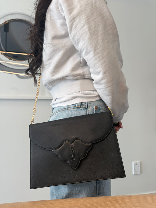 Authentic Yves Saint Laurent Magnetic closure crossbody clutch with added removeable strap fits phones keys makeup etc