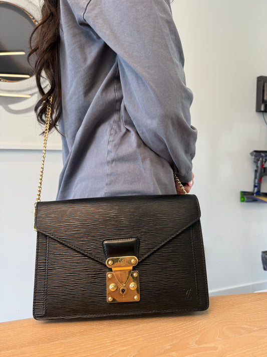 Authentic Louis Vuitton Epi Dragonne wristlet with added removeable strap ! Fits all phones wallets keys makeup etc ! Inside pocket is clean!