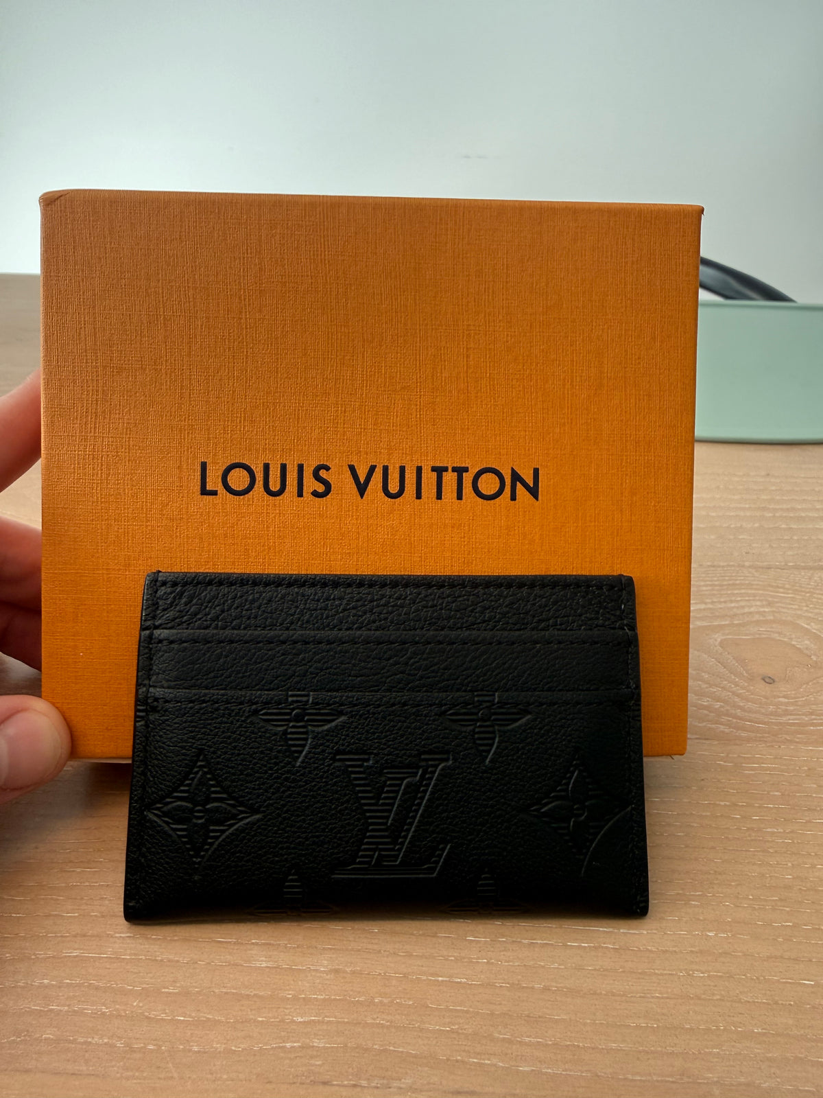 Authentic Louis Vuitton Black empriente double side cardholder in box client paid $650 plus tax worn once literally brand new !