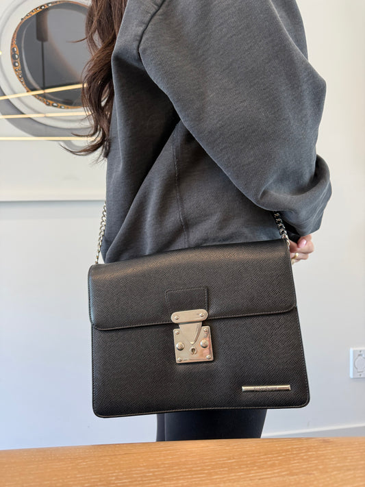 Authentic Yves Saint Laurent Heavy Duty Epi Black / Silver lock box crossbody clutch in black and silver with added removeable strap fits phones wallets cards cash coins etc