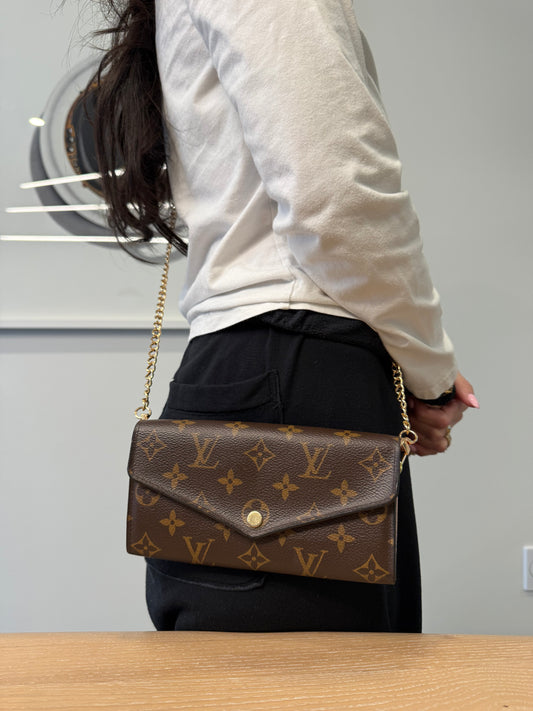 Authentic Louis Vuitton Sarah Monogram Pink Interior wallet with added removeable strap ! In dustbag fits phones cards cash coins etc retail $910