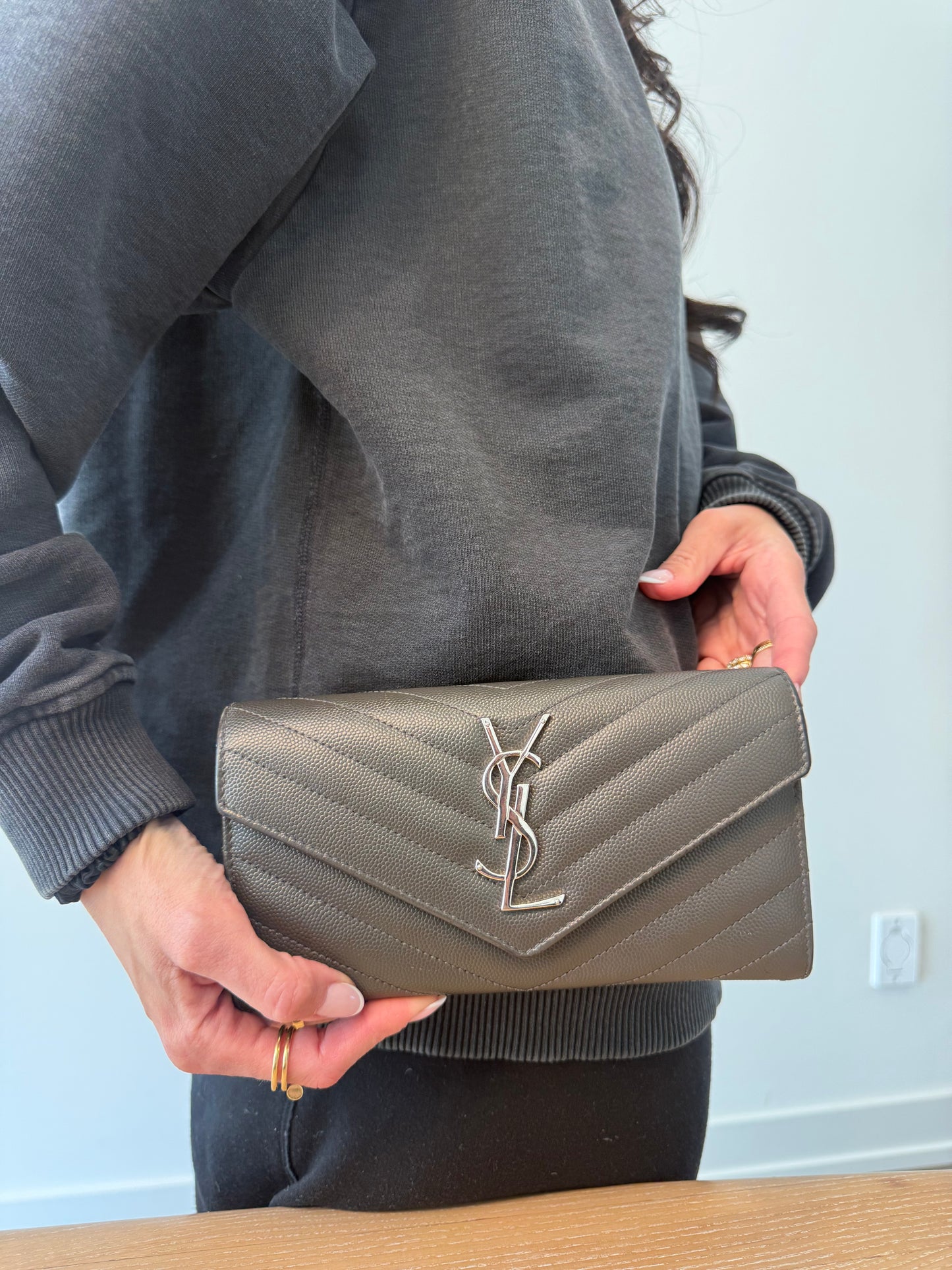 Authentic Yves Saint Laurent Cassandra Grey/Silver Wallet with added removeable strap in box and dustbag! Retail $1295 plus tax fits phones cards cash coins etc