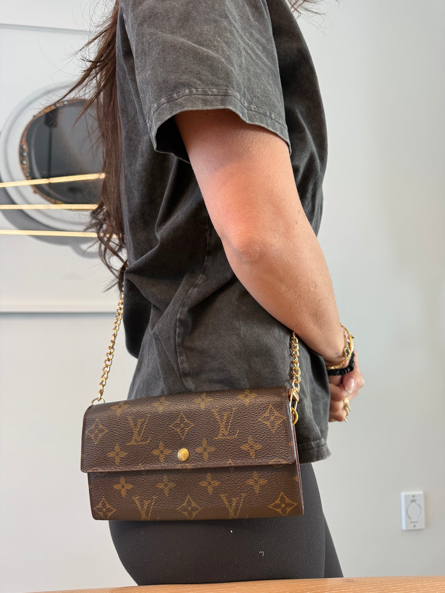 Authentic Louis Vuitton Monogram Sarah wallet with added removeable strap fits phones cards cash coins etc ! Pristine condition
