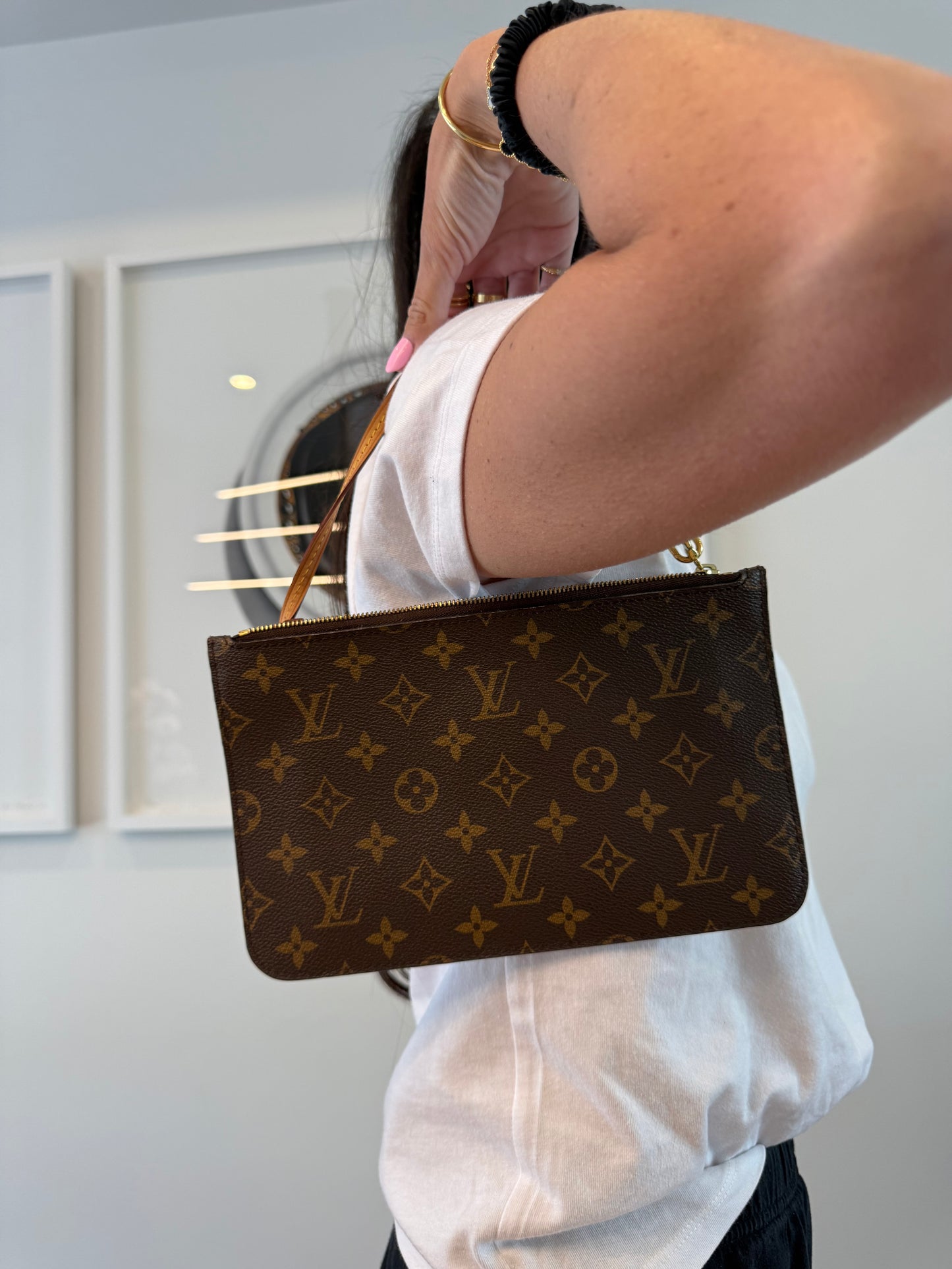Authentic Louis Vuitton Monogram Pochette GM with original lv wristlet in pristine condition inside and out ! Fits phones keys cards cash coins makeup etc