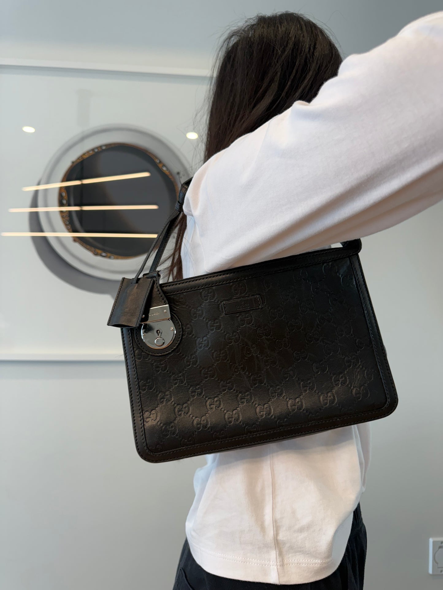 Authentic Gucci Guccisima black and silver Shoulder pochette and wristlet! Heavy heavy duty with keys and lock mechanism!