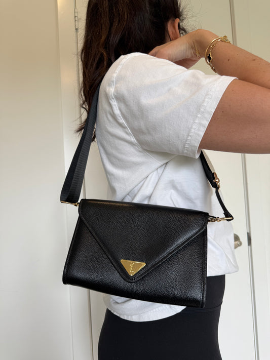 Yves saint Laurent magnetic closure crossbody clutch black and gold in absolute pristine condition with added strap