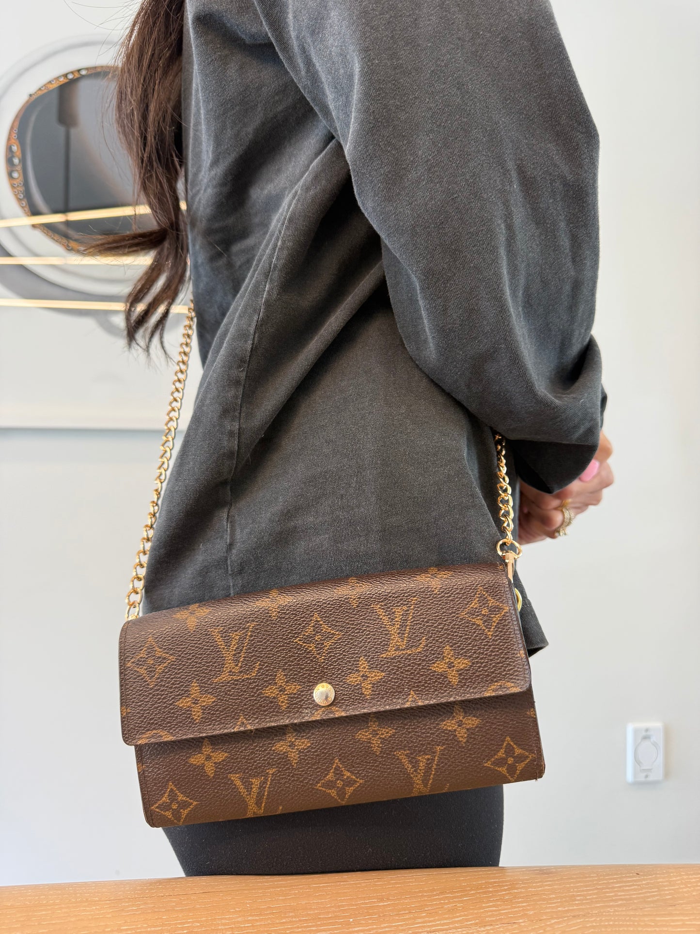 Authentic Louis Vuitton monogram Sarah wallet with added removeable strap! Fits phones cards cash coins !