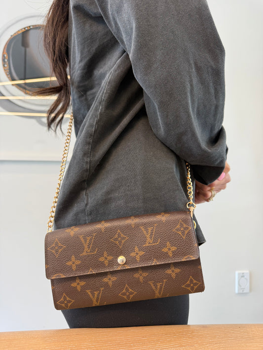 Authentic Louis Vuitton monogram Sarah wallet with added removeable strap! Fits phones cards cash coins !