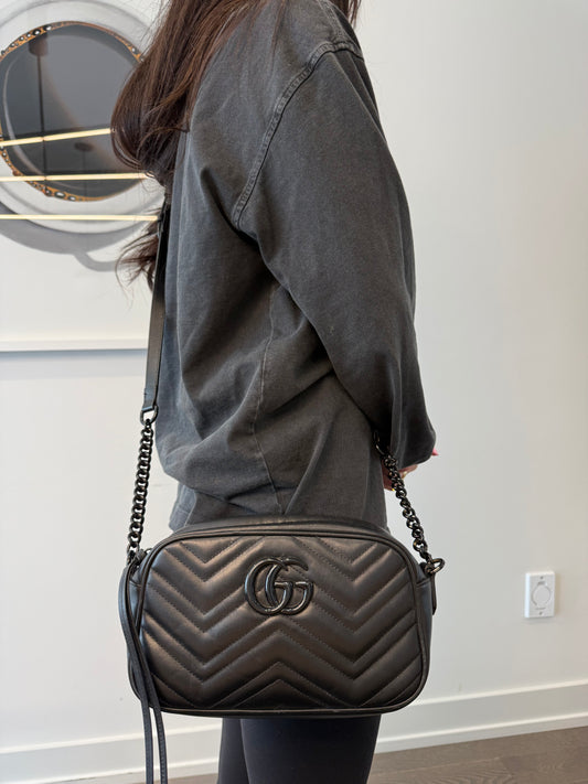 Authentic Gucci Marmont Black On Black Camera Zipper top adjustable strap crossbody bag in gorgeous preloved condition!! Retail $2500 plus tax ! I want over 50% off!! Phones wallets keys makeup etc fit !