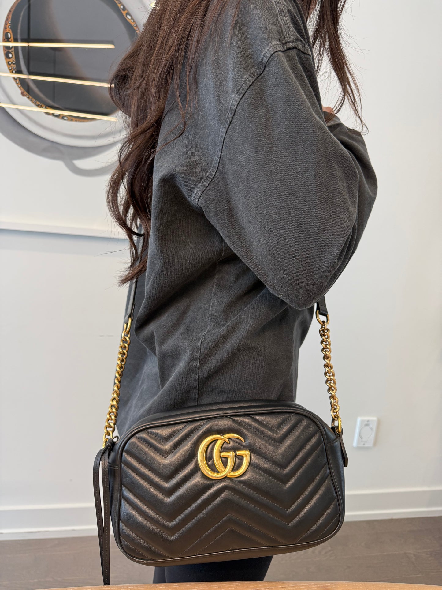 Authentic Gucci Marmont Black and Gold Adjustable leather and chain camera crossbody bag ! Retail over $2500 over 50% off !! Gorgeous preloved condition! Phones wallets keys makeup etc