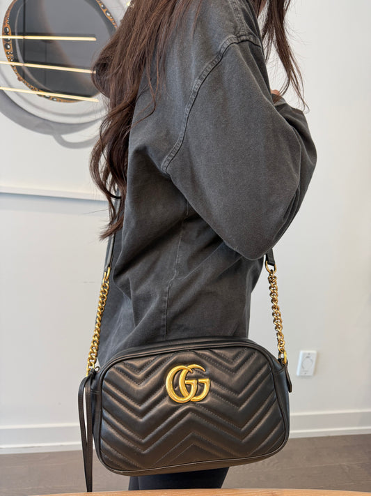 Authentic Gucci Marmont Black and Gold Adjustable leather and chain camera crossbody bag ! Retail over $2500 over 50% off !! Gorgeous preloved condition! Phones wallets keys makeup etc