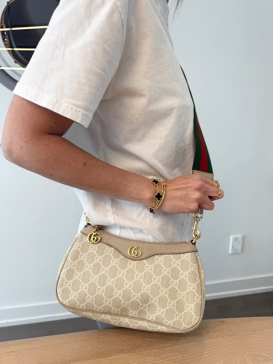 Authentic Gucci Supreme Pochette with Original Adjustable Ophidia Strap! 9.5/10 condition!! Fits phones wallets keys makeup etc. $2570 plus tax in stores!!