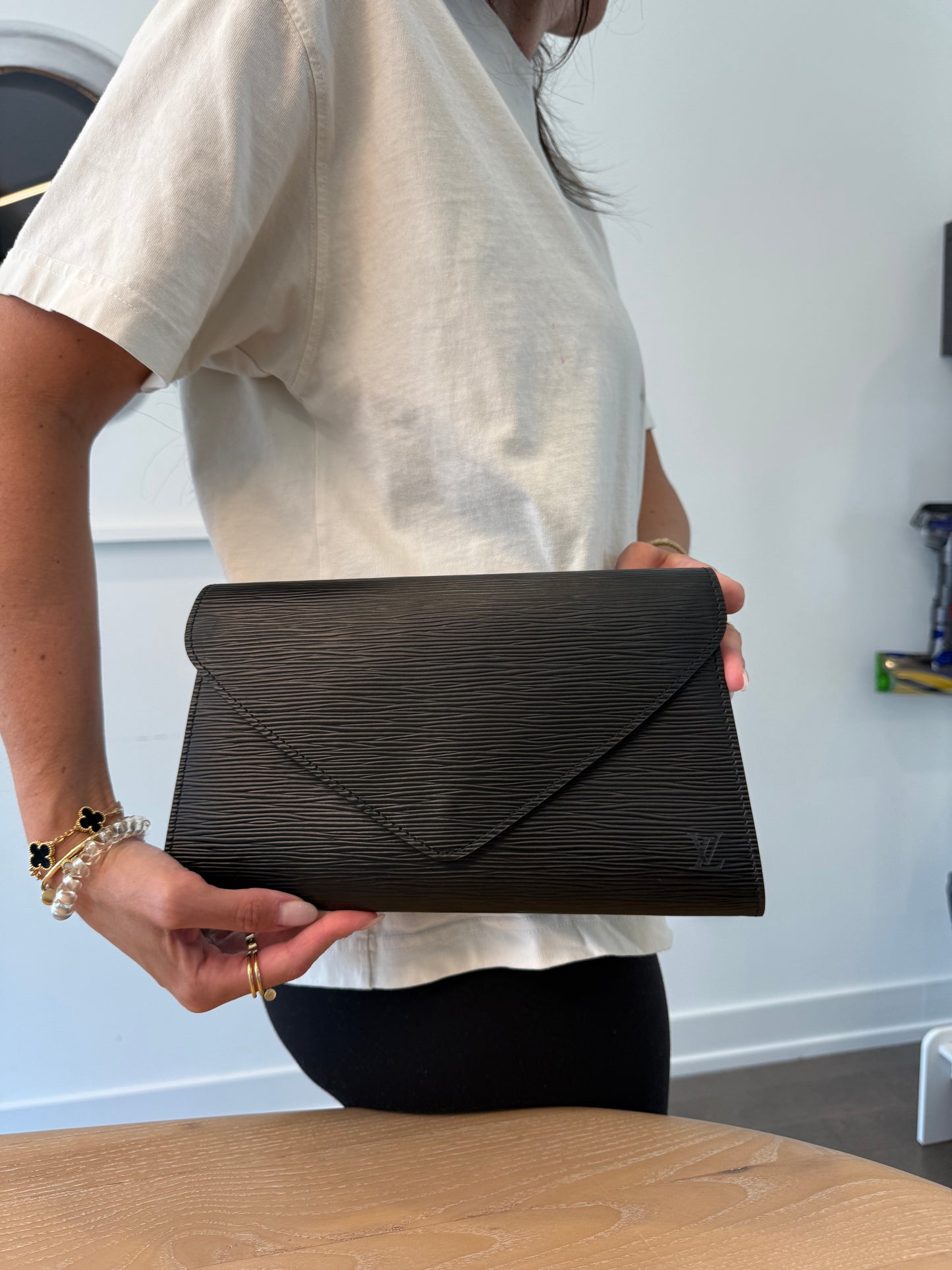 Louis Vuitton epi black arts deco gm clutch with added crossbody strap fits phones wallets etc gorgeous condition