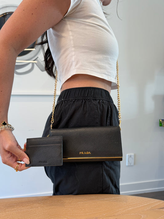 Prada saffiano black/gold wallet with original removable cardholder plus added strap fits cards cash coins phones etc ! Retail $1290
