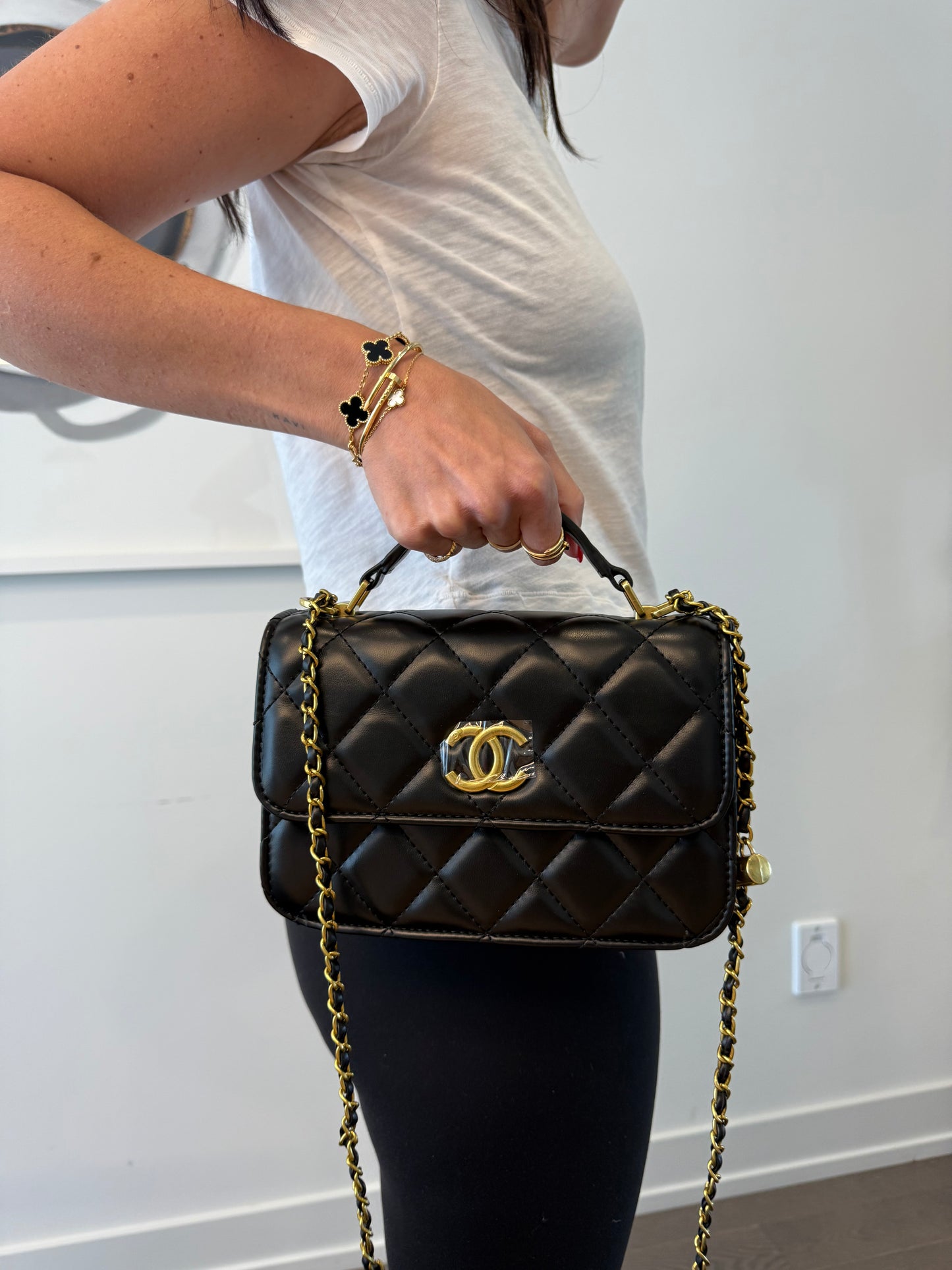 Brand New Chanel quilted top handle black/gold medium Makeup crossbody!! Fits phones keys makeup etc this is a vip piece that’s complimentary to high purchase clients , not a $15,000 bag