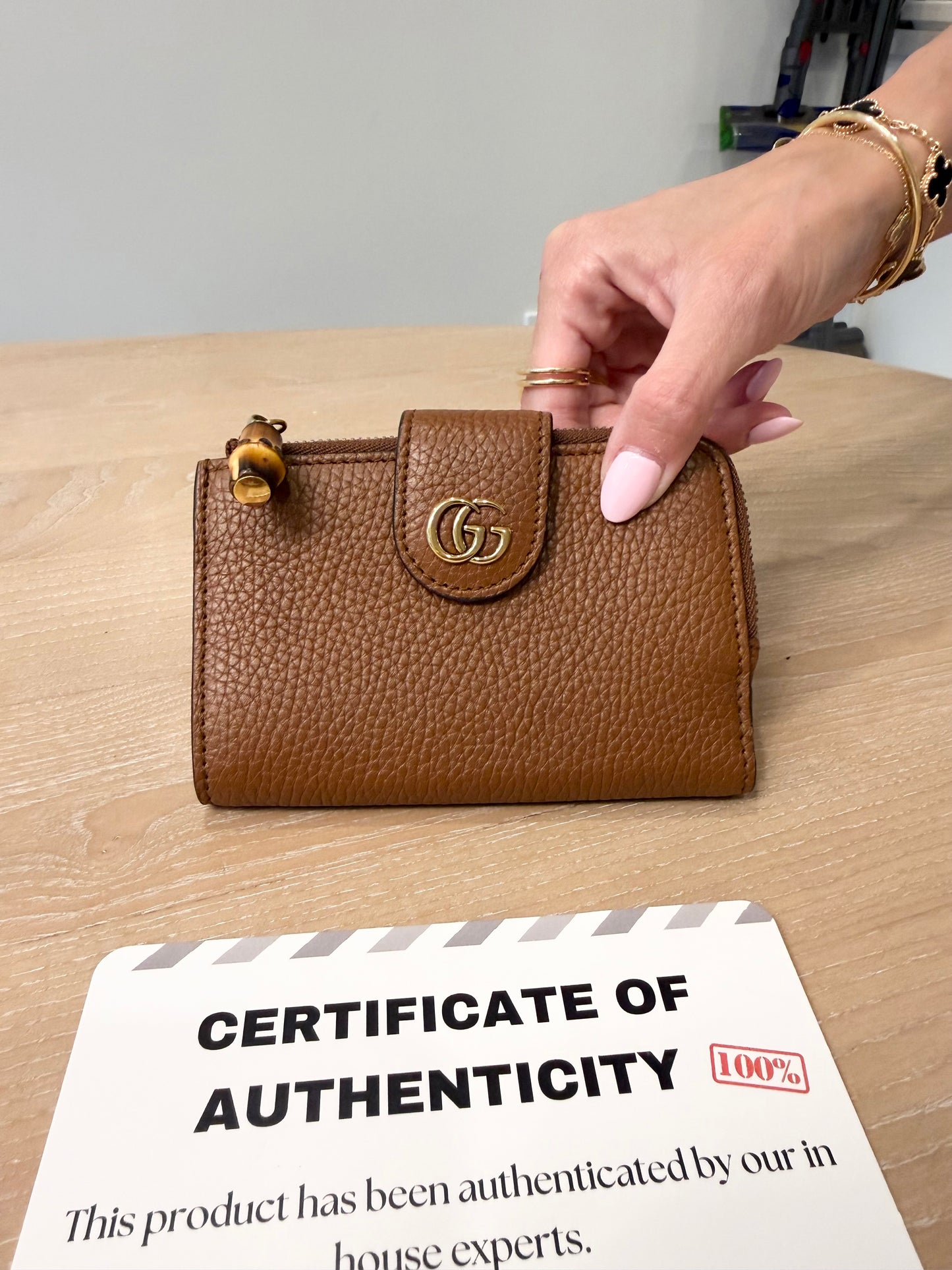 Authentic Gucci Bamboo Bi Fold Brown Calf Skin Coin Zipper wallet . Brand new condition inside and out retail $900