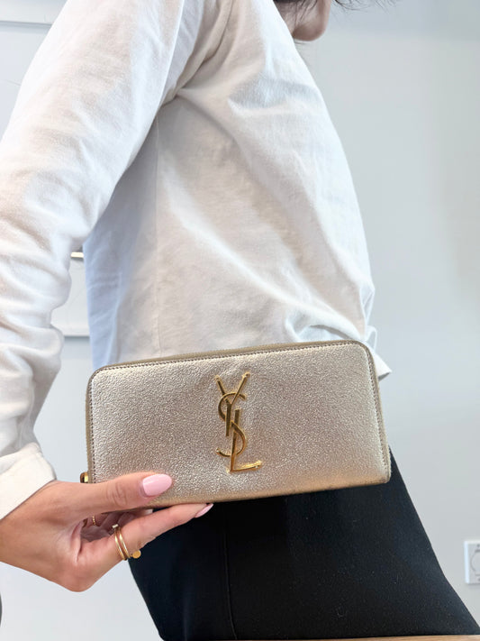 Authentic Yves Saint Laurent Metallic Silver Gold Logo zip around ! Retail $1200