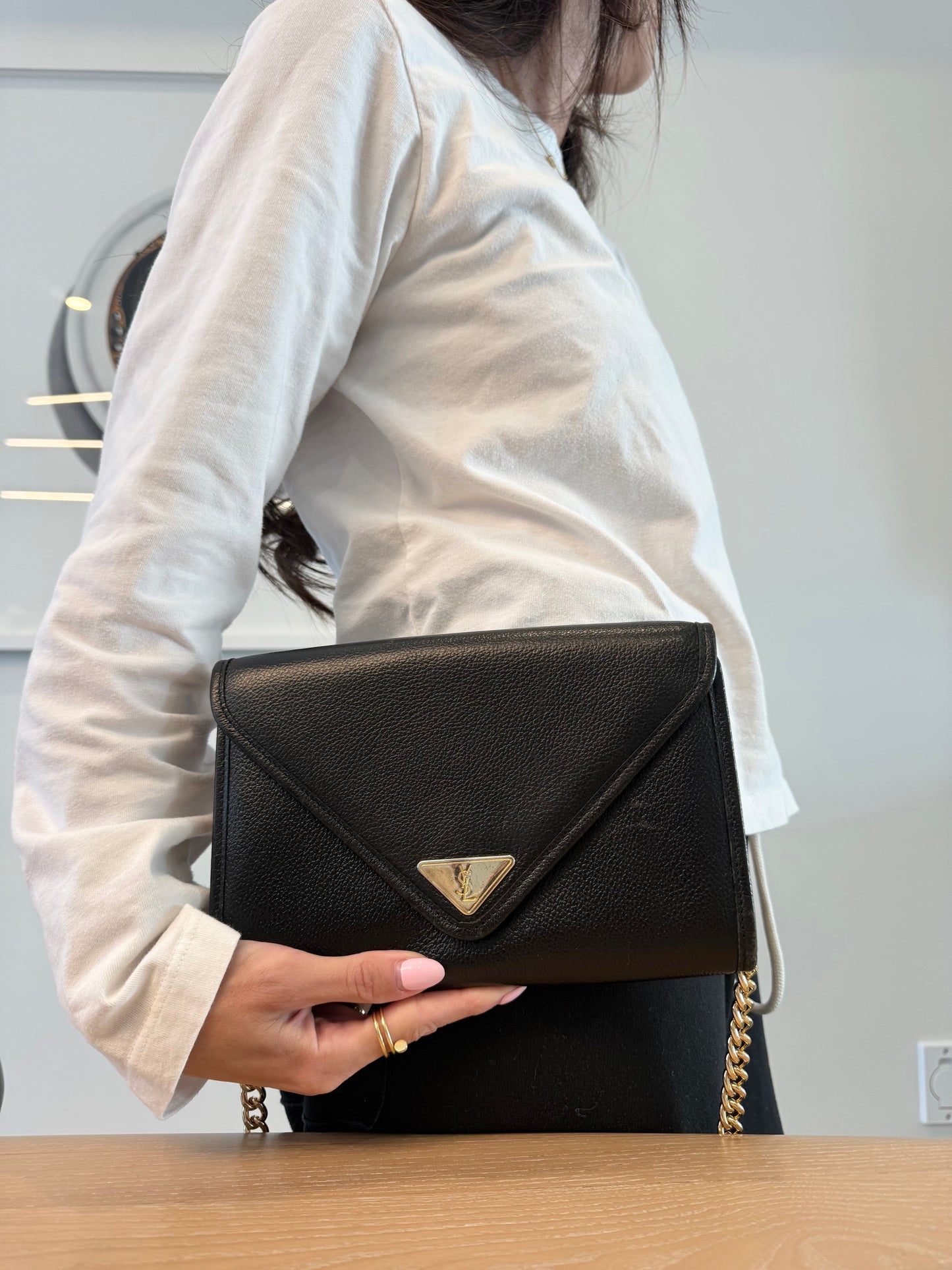 Authentic Yves Saint Laurent magnetic closure black on black crossbody clutch with added strap in gorgeous condition!